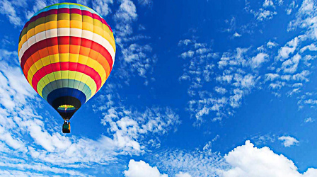 Grand Rapids Balloon Rides in West Michigan Hot air balloon floating over West Michigan near Hastings
