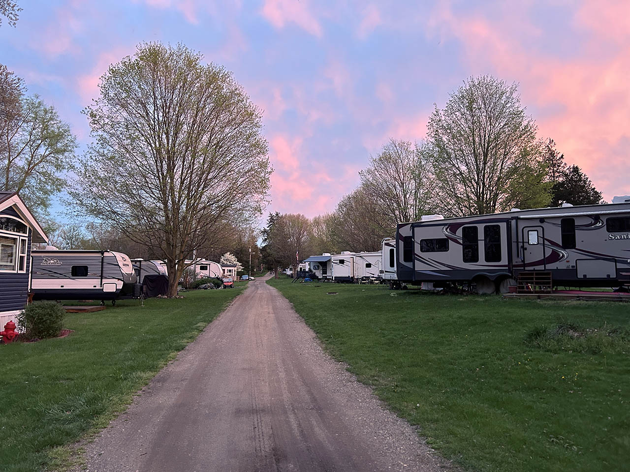 Seasonal Camping at Whispering Waters Campground Seasonal RV campsites at Whispering Waters Campground in Hastings, Michigan during sunset